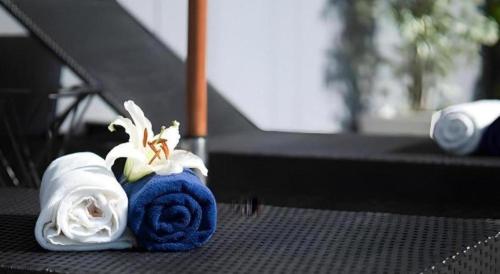 a toy dragon sitting on top of a table at B2 Amata Nakorn Premier Hotel in Ban Chak Samo