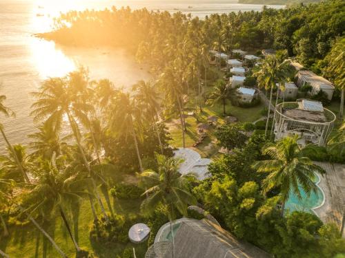 an aerial view of a resort next to the ocean at Hideout Koh Kood in Ko Kood