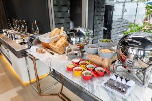A counter with various food items on it at U Jomtien Pattaya