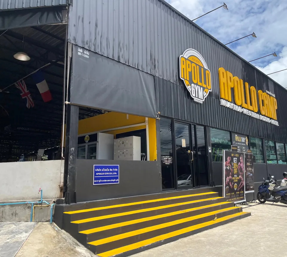 Apollo Camp gym frontage with yellow entrance steps on Soi Taied