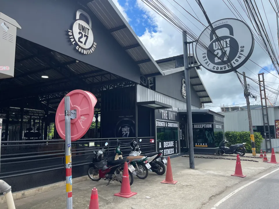 Unit 27 Total Conditioning signs and reception entrance on Soi Taied