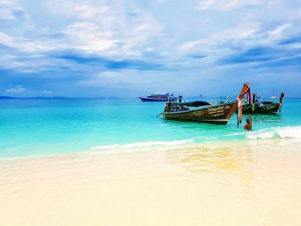 Longtail boats on a Thai beach