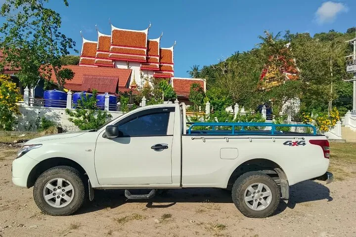 Convenient pickup service by local truck from your hotel on Koh Tao