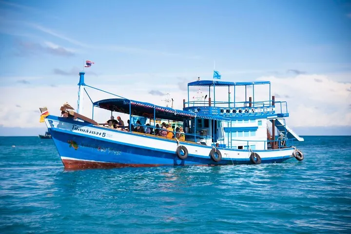 Chug on a modified fishing vessel around Koh Tao