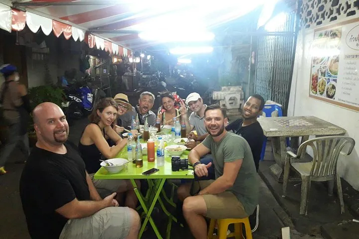 Visit local street food vendors