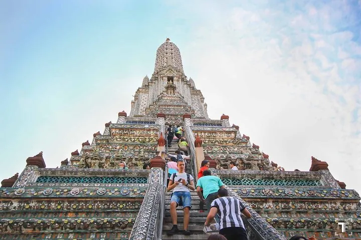 Wat Arun stands majestically over the water