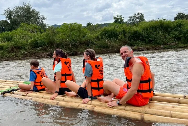 Experience the beauty of the jungle while Bamboo Rafting on the peaceful Wang River