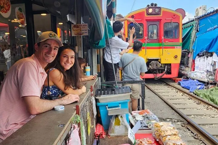 Photo with Train passing the market at MaeKlong